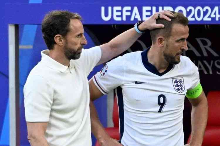 Harry Kane, dan pelatih Gareth Southgate pada laga perempat final Piala Eropa 2024 kontra Swiss (6/7/2024).(AFP/INA FASSBENDER via kompas.com)